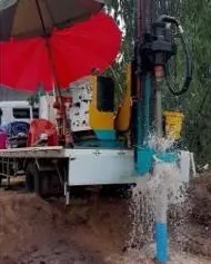 Drilling rig sinking a water well