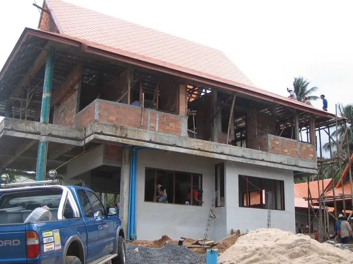 Thai-Style Residence, Koh Samui: tiled roof on, walls rendered