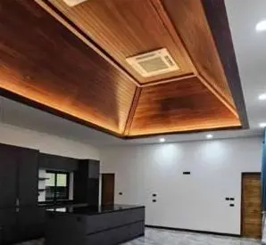 Residential 1-Storey House, Maenam: kitchen and timber ceiling