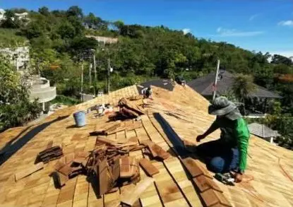3 Residential Roof Structures, Bophut: laying the timber shingles